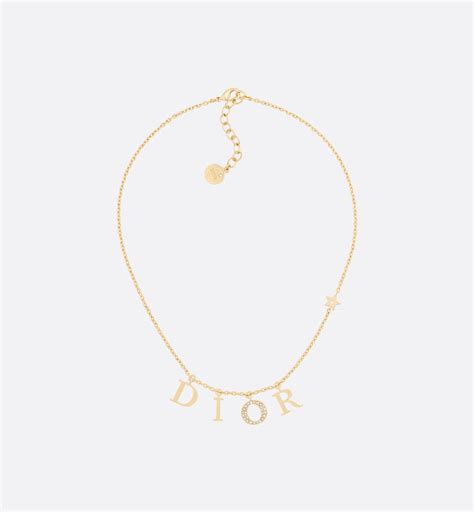 gold necklace that says dior